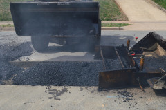 Asphalt Paving Machine Spreading Asphalt Fairfax VA